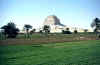 Meidum Pyramid seen behind green fields